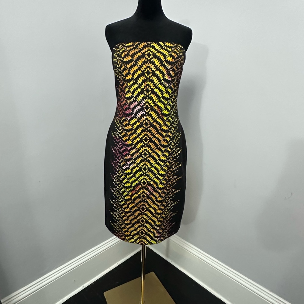 Bebe strapless dress with chain the detailing in the back